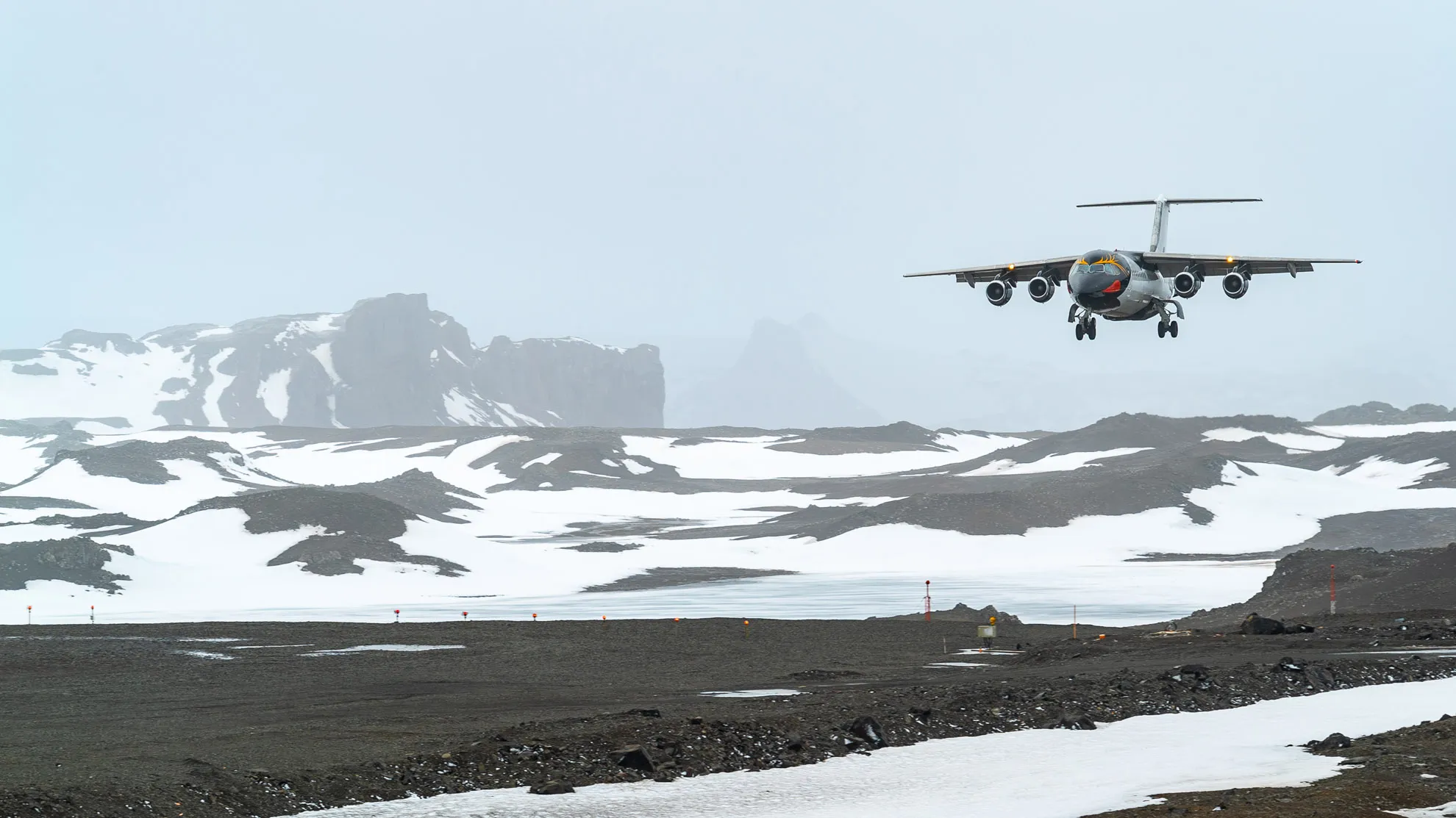 The two-hour BAE 146 charter flight from Punta Arenas to King George Island — the Air-Cruise difference.